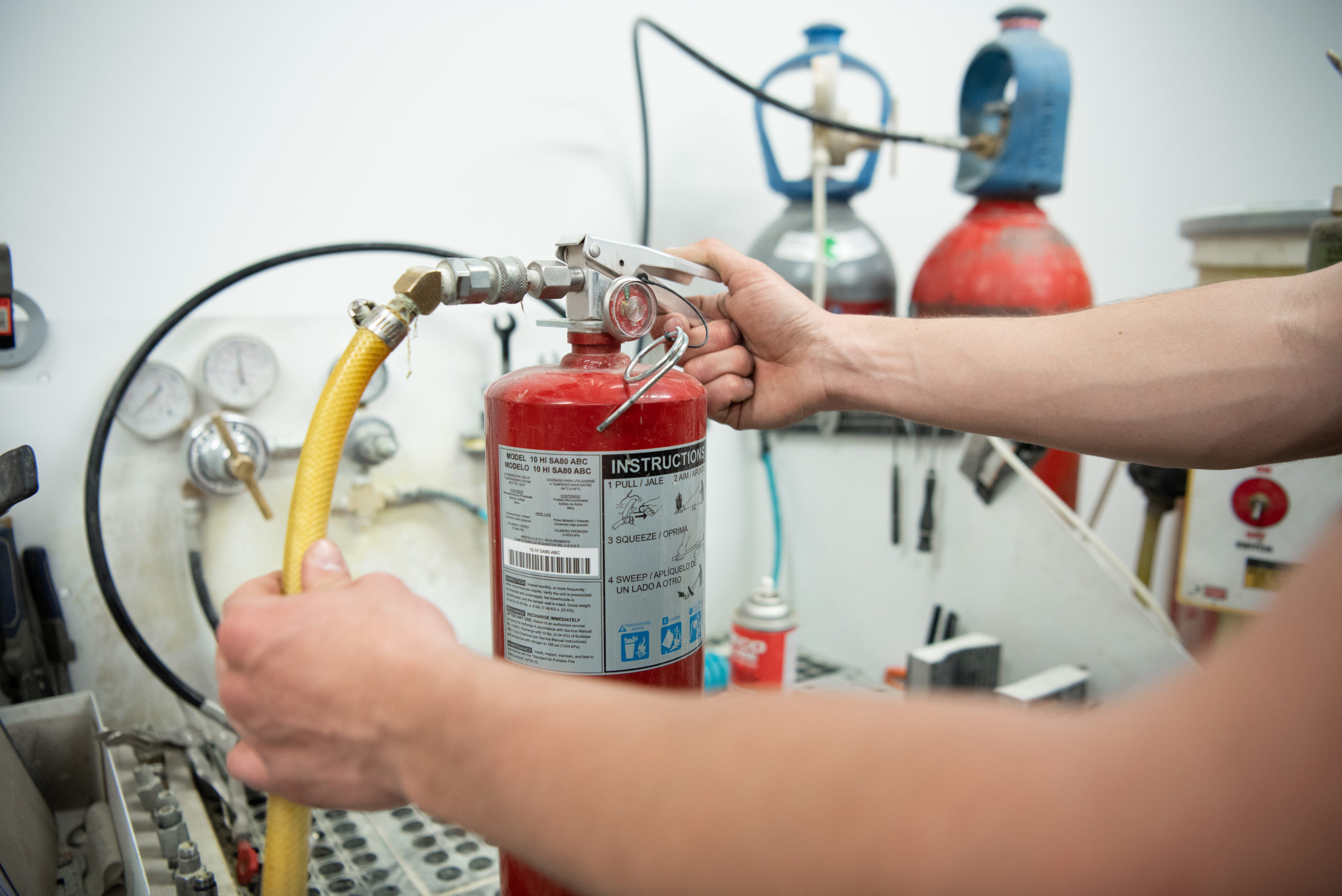 Portable fire extinguisher clearance service